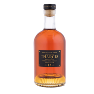 Bouteille de whisky Tharcis 13 ans Sherry Cask de la Distillerie HEPP, single malt alsacien couleur cuivrée, plaque noire à texte et rivets dorés, bouchon en liège